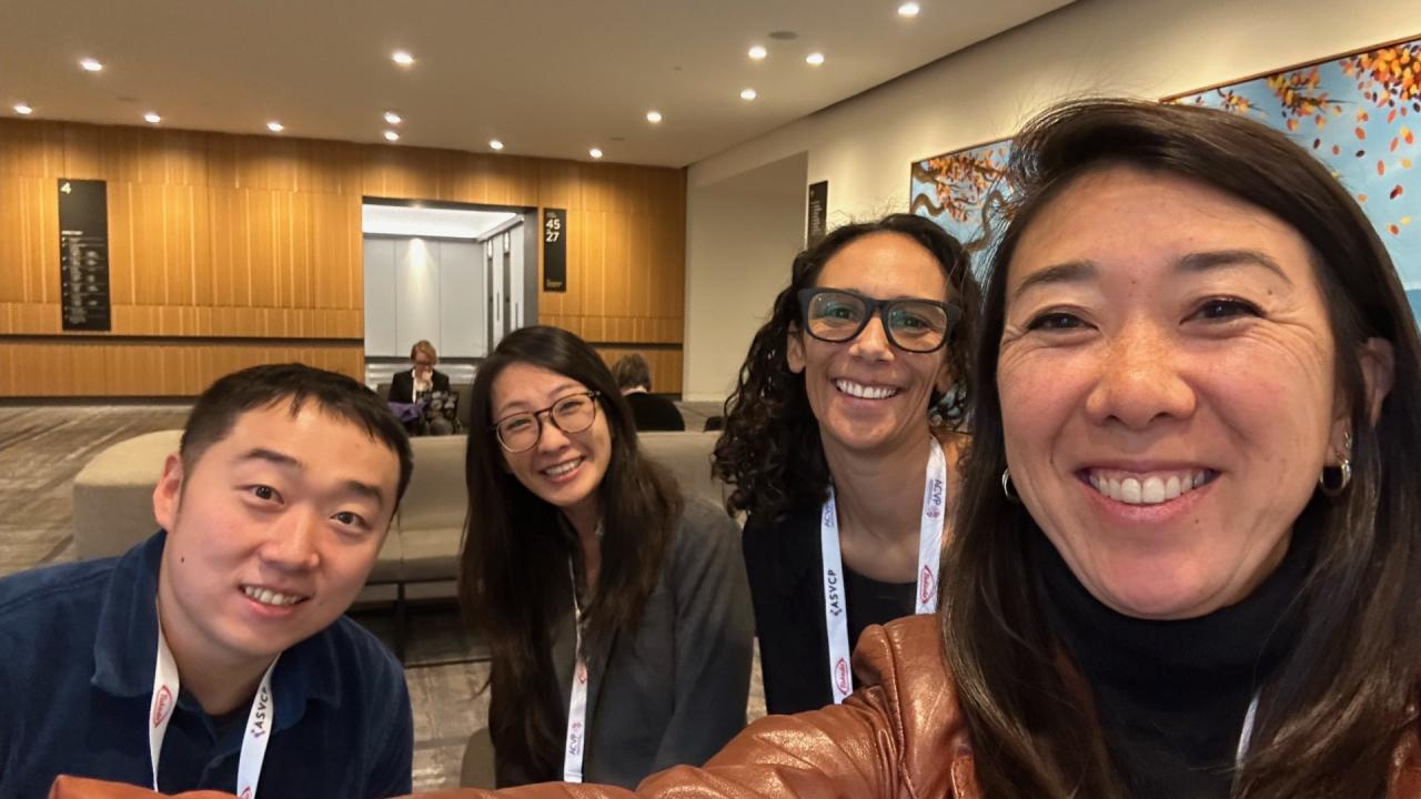Dr. Imai-Leonard, Dr. Marietta Barro, Dr. Polly Chen, and Jiashi Feng gathered around for a photo. 